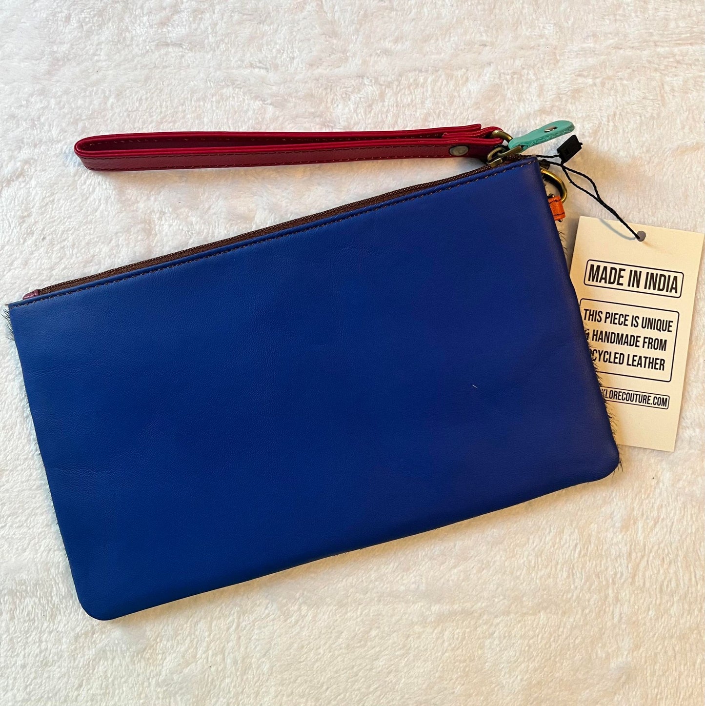 Vance Triple Zip Leather Hair on Hide Wristlet